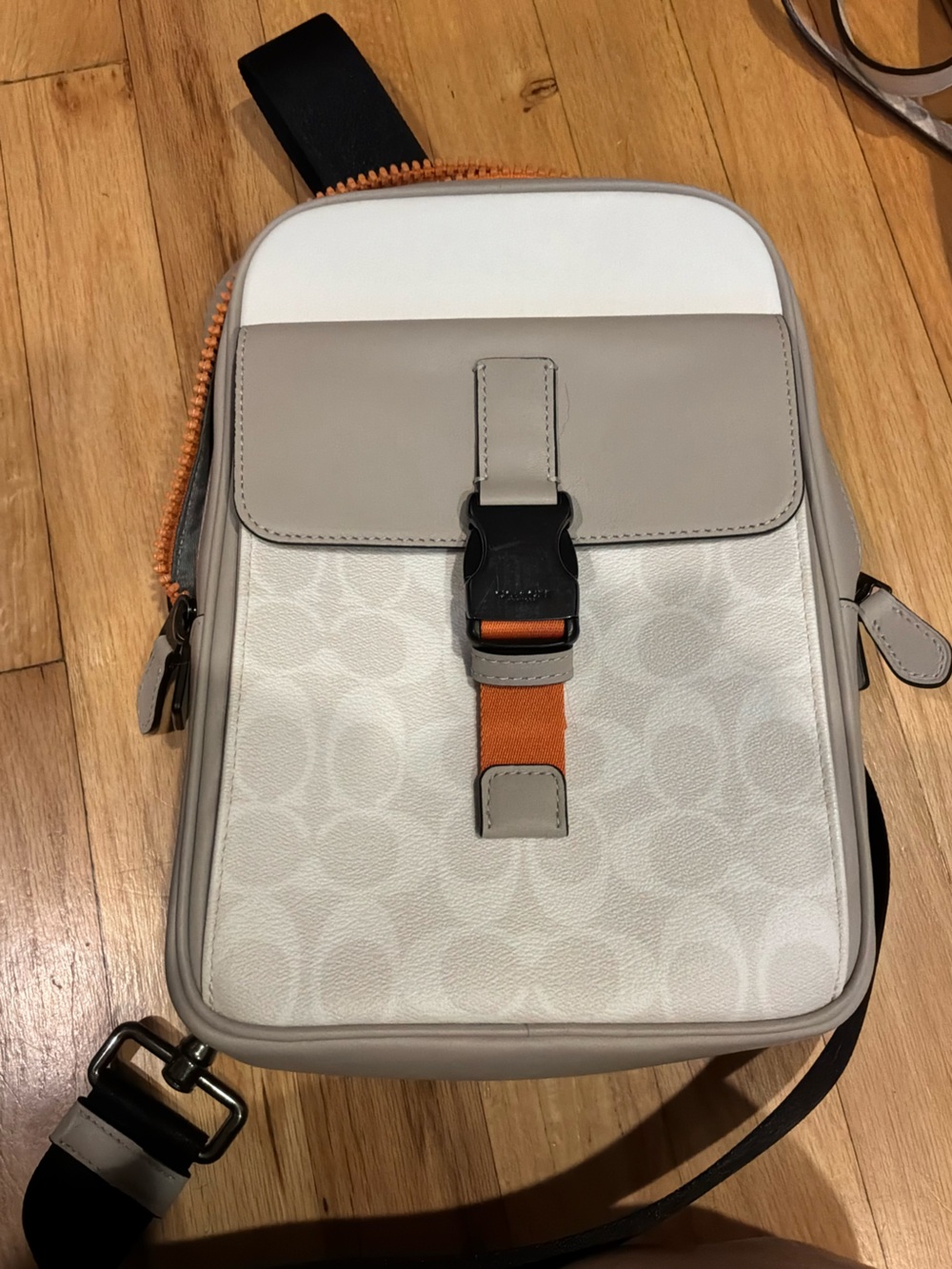 Coach womens Beige & White Crossbody Sling Bag with Orange Accent